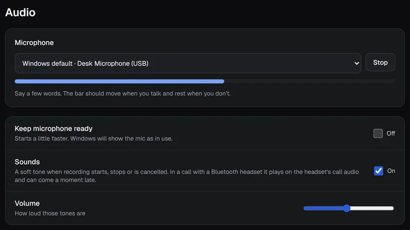 Settings › Microphone: the microphone list, a live level bar, and the Sounds and Volume settings